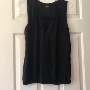 Black sleeveless top with tie at neck